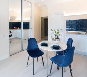 Η κουζίνα ή μικρή κουζίνα στο Apart hotel Greenwood near Sea