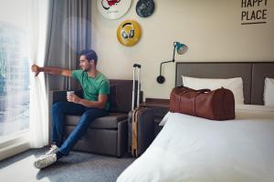 Postel nebo postele na pokoji v ubytování Rove Healthcare City - Bur Dubai