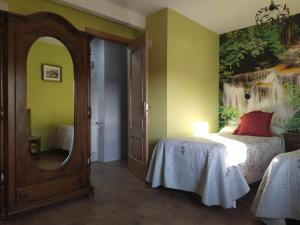 Postel nebo postele na pokoji v ubytování El Balcon de Peñafiel