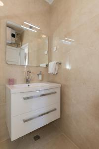 Kúpeľňa v ubytovaní Apartments Urbis
