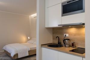 Kuchyňa alebo kuchynka v ubytovaní Apartments Urbis