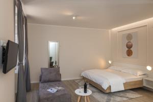 Posteľ alebo postele v izbe v ubytovaní Apartments Urbis