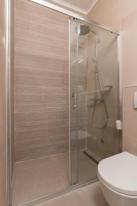 Kúpeľňa v ubytovaní Apartments Urbis