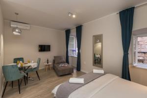 Posteľ alebo postele v izbe v ubytovaní Apartments Urbis