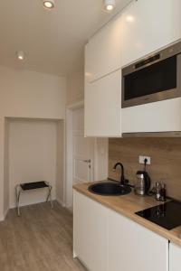 Kuchyňa alebo kuchynka v ubytovaní Apartments Urbis