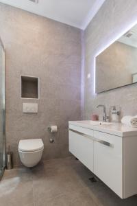 Kúpeľňa v ubytovaní Apartments Urbis