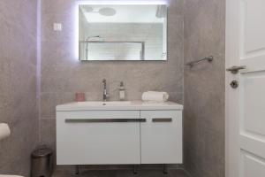 Kúpeľňa v ubytovaní Apartments Urbis