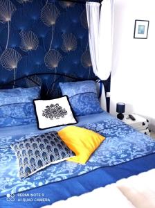 Letto o letti in una camera di La Douce Parenthèse B&B entre bois et champs-Accueil motards