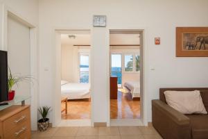 Postel nebo postele na pokoji v ubytování Adriatic Beach Suites