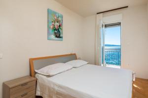 Postel nebo postele na pokoji v ubytování Adriatic Beach Suites
