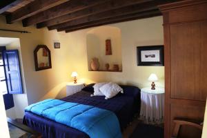 Postel nebo postele na pokoji v ubytování Posada del Fresno