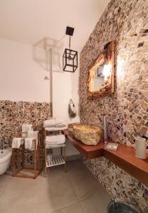 Kúpeľňa v ubytovaní Leonardo Trulli Resort + 22 fotografií