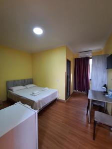 Letto o letti in una camera di Delta Hotel