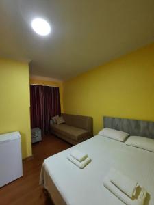 Letto o letti in una camera di Delta Hotel