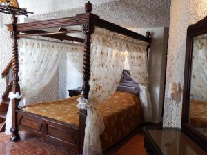 Voodi või voodid majutusasutuse Hotel Porto Perissa toas