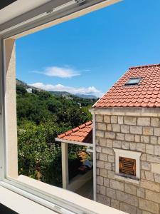a view from a window of a house at Madonna Guesthouse II in Dubrovnik