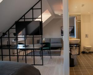 Postel nebo postele na pokoji v ubytování Hotel Fredensborg Store Kro