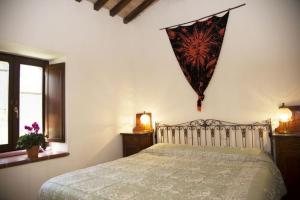 Postel nebo postele na pokoji v ubytování B&B BOSCOVECCHIO