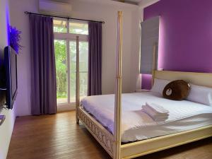 Katil atau katil-katil dalam bilik di Mu bank Villa 慕堤包棟休閒別墅