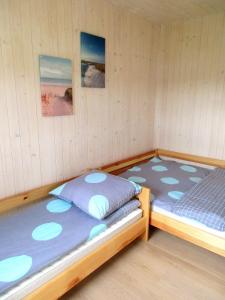 Postel nebo postele na pokoji v ubytování Domki Selma
