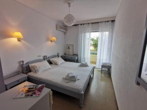 Postel nebo postele na pokoji v ubytování Hotel Rania
