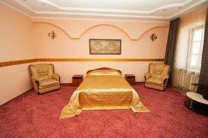 Una cama o camas en una habitación de Viva Hotel