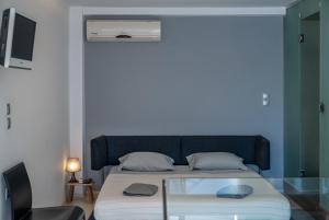 Posteľ alebo postele v izbe v ubytovaní Seaside Maisonette in Itea