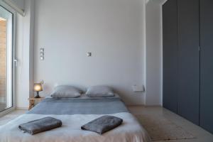Letto o letti in una camera di Seaside Maisonette in Itea
