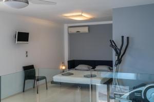 TV o dispositivi per l'intrattenimento presso Seaside Maisonette in Itea