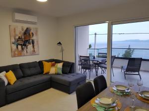 Posezení v ubytování La Vista apartments