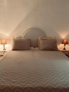 En eller flere senge i et værelse på Casa Chiquito