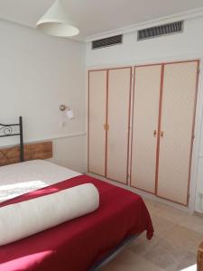 Łóżko lub łóżka w pokoju w obiekcie Pisos con piscina de temporada corta estancia