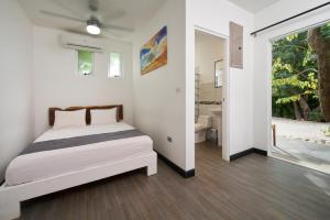 Voodi või voodid majutusasutuse In the Shade Hotel - Coworking - 300Mbit - Adults Only toas