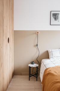 Posteľ alebo postele v izbe v ubytovaní Powder Apartment - LoftAffair