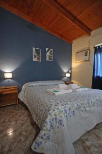 Postel nebo postele na pokoji v ubytování Las Cabañas