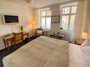 Katil atau katil-katil dalam bilik di deckerts Hotel am Katharinenstift