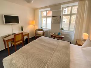 Postel nebo postele na pokoji v ubytování deckerts Hotel am Katharinenstift