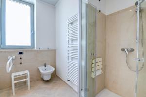 Koupelna v ubytování Hotel Rivus