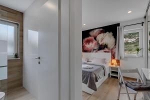 Postel nebo postele na pokoji v ubytování Studio apartmani Buljan