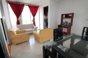 Χώρος καθιστικού στο Hotel zandalo medellin
