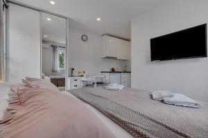 Postel nebo postele na pokoji v ubytování Studio apartmani Buljan