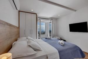 Postel nebo postele na pokoji v ubytování Studio apartmani Buljan