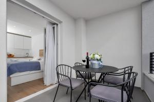 Postel nebo postele na pokoji v ubytování Studio apartmani Buljan