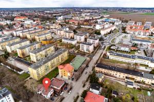 an aerial view of a city with buildings at Apartament Stylowy in Leszno