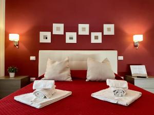 Cama o camas de una habitación en Le Coq Suites