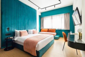 Postel nebo postele na pokoji v ubytování Colors Hotel Athens