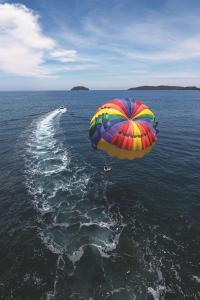 a colorful umbrella floating in the water at Shangri-La Tanjung Aru, Kota Kinabalu in Kota Kinabalu