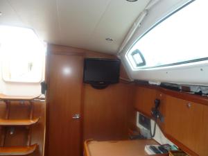 TV a/nebo společenská místnost v ubytování Le Vele Residence Sailing Boat