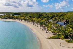 an aerial view of the beach at a resort at Shangri-La Le Touessrok, Mauritius in Trou dʼ Eau Douce