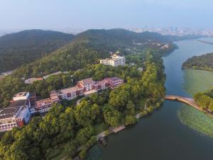 an aerial view of a building next to a river at Shangri-La Hangzhou in Hangzhou